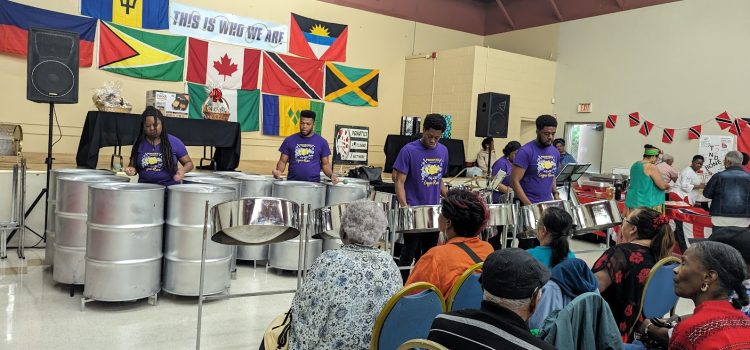 Annual Multicultural Day 2025 Panatics steelpan in front of Multicultural Day 2024 event stage