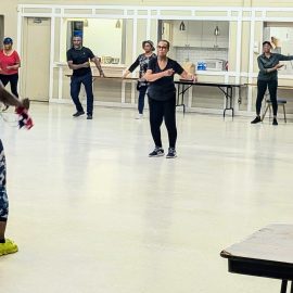 dance fitness workout class with instructor in front