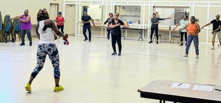 Soca Dance Fitness Session is BACK! dance fitness workout class with instructor in front
